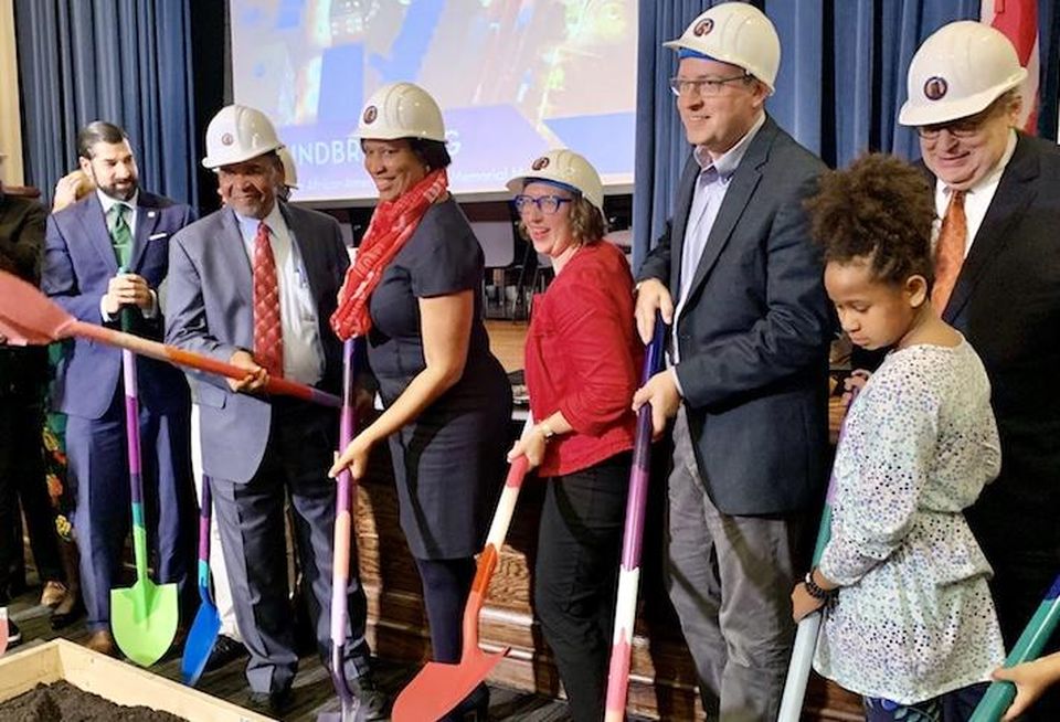 Mayor Muriel Bowser and the development team celebrating the groundbreaking of the Grimke School redevelopment