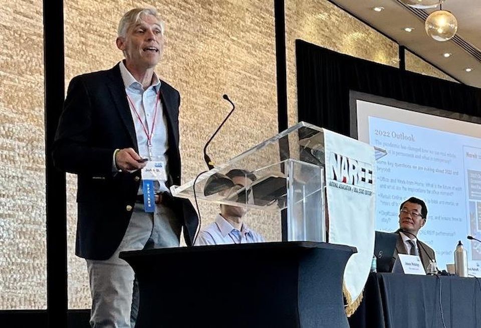 Nareit's John Worth speaking at the National Association of Real Estate Editors conference in Miami.