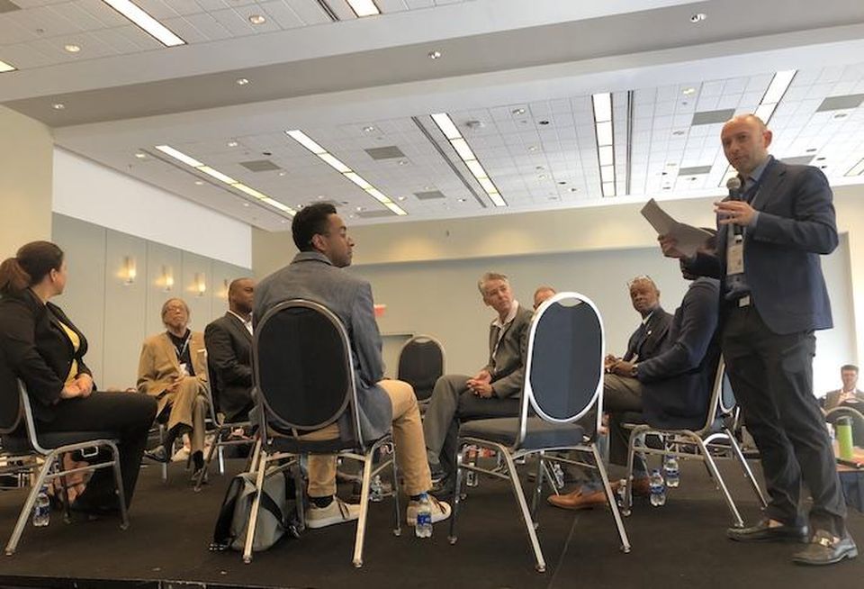 EYA's Evan Goldman (right) speaking on a fishbowl panel with several D.C. stakeholders