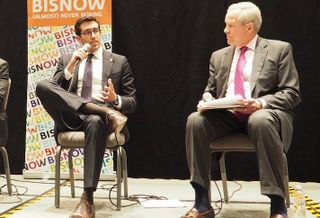 HUD's Alfonso Costa and National Multifamily Housing Council's Doug Bibby at a 2019 Bisnow event. 