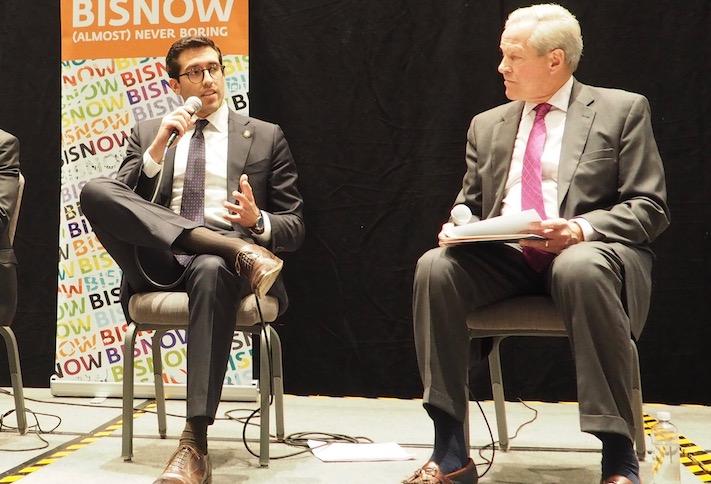 HUD's Alfonso Costa and National Multifamily Housing Council's Doug Bibby at a 2019 Bisnow event. 