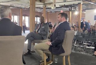 Massachusetts Life Sciences Center's Kenn Turner and MassBio's Ben Bradford at Bisnow's Boston Life Sciences Real Estate Conference.