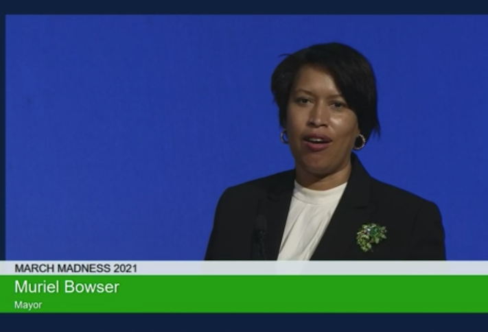 Mayor Muriel Bowser speaking at DMPED's March Madness event Wednesday. 