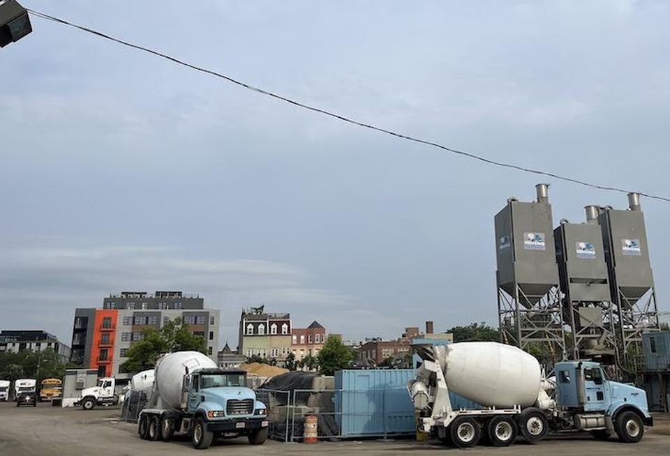 The site where the new SEC headquarters is planned, photographed Tuesday June 20, is now being used as a concrete mixing plant and as a parking lot.