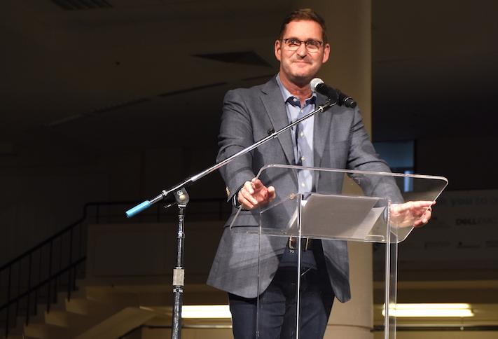 Amazon Vice President of Global Real Estate and Facilities John Schoettler speaking at a fundraising event for Seattle nonprofit Mary's Place in 2018. 