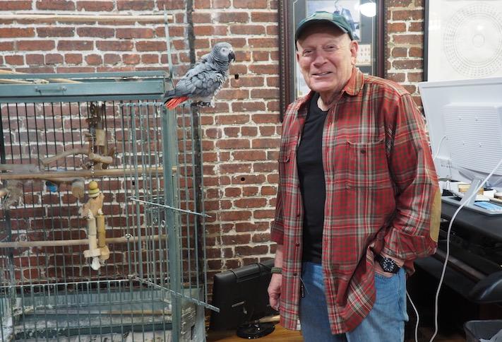 Douglas Jemal with his parrot in Douglas Development's Chinatown office