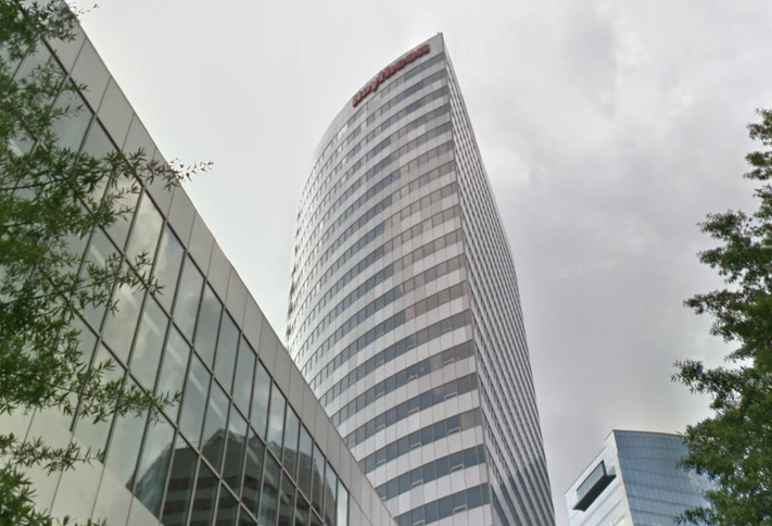 The 1100 Wilson Blvd. office tower in Rosslyn, with Raytheon's name on top. 