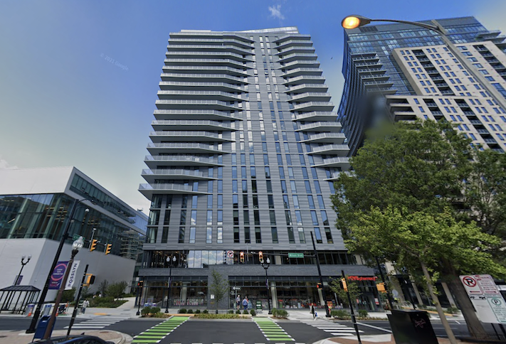 The 23-story apartment building at 1788 North Pierce St. in Arlington that Penzance delivered last year and Cortland has now acquired. 