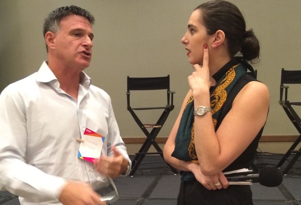 Attorney Howard Stern and Bisnow event coordinator Abigale James discss the evernt.