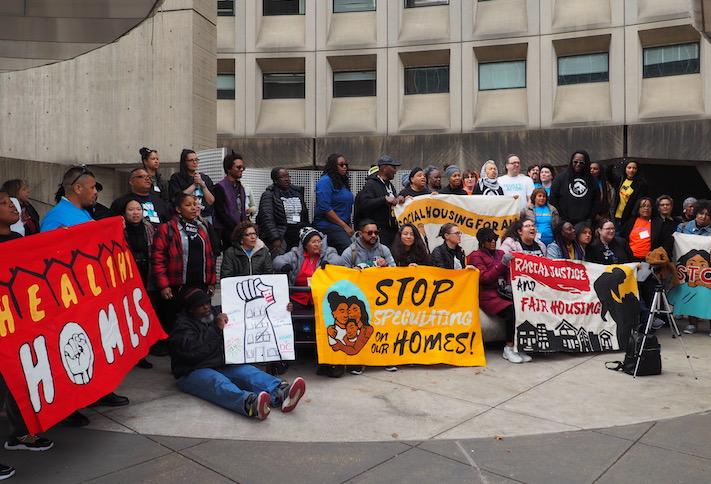 Housing advocates protesting outside the HUD headquarters. 
