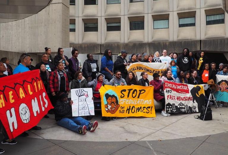 Housing advocates protesting outside the HUD headquarters. 