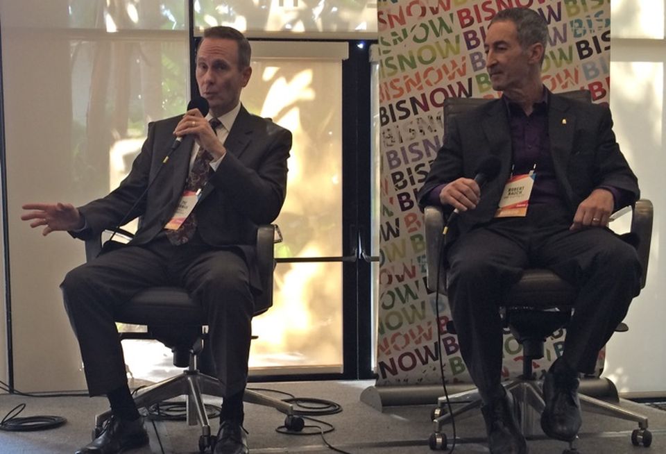 Tye Turman and Robert Rauch discussing hotel development in Downtown San Diego