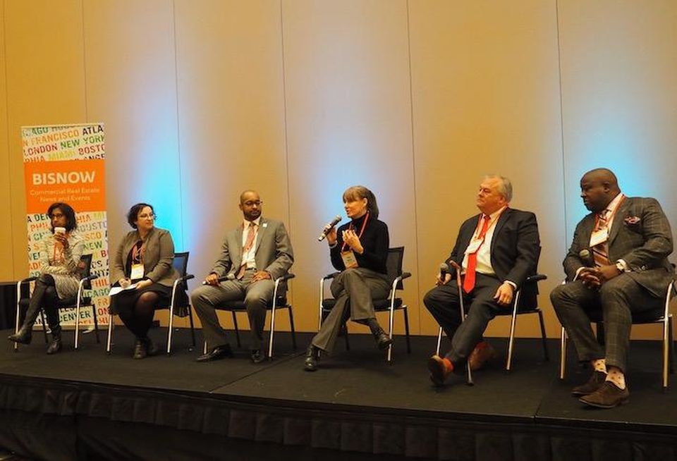 National Housing Trust's Priya Jayachandran, Ballard Spahr's Amy Glassman, DCHD's Drew Hubbard, McCormack Baron Salazar's Pam Askew, United Bank's Joe Lemense and DCHFA's Christopher Donald speaking at BMAC.