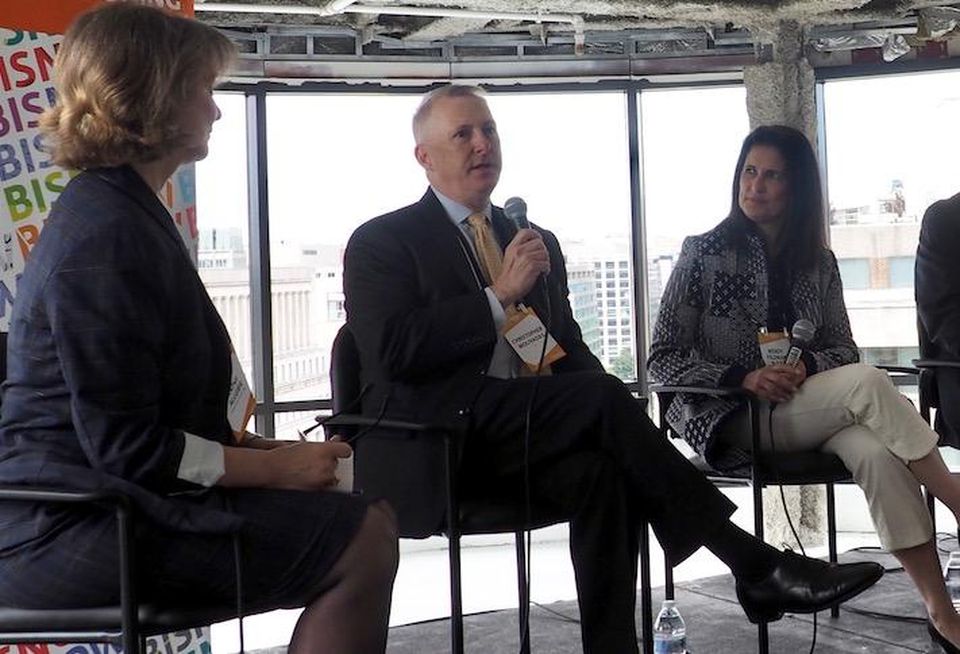 JLL's Chris Molivadas speaking at a 2019 Bisnow event