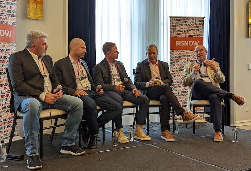 JLL’s Sean Reynolds discusses the Chicago data center market at Bisnow’s DICE Midwest. He is joined by (from left to right): Aligned’s Phill Lawson-Shanks, NYI’s Phillip Koblence, Legacy Investing’s John Day and ServerFarm’s Avner Papouchado.