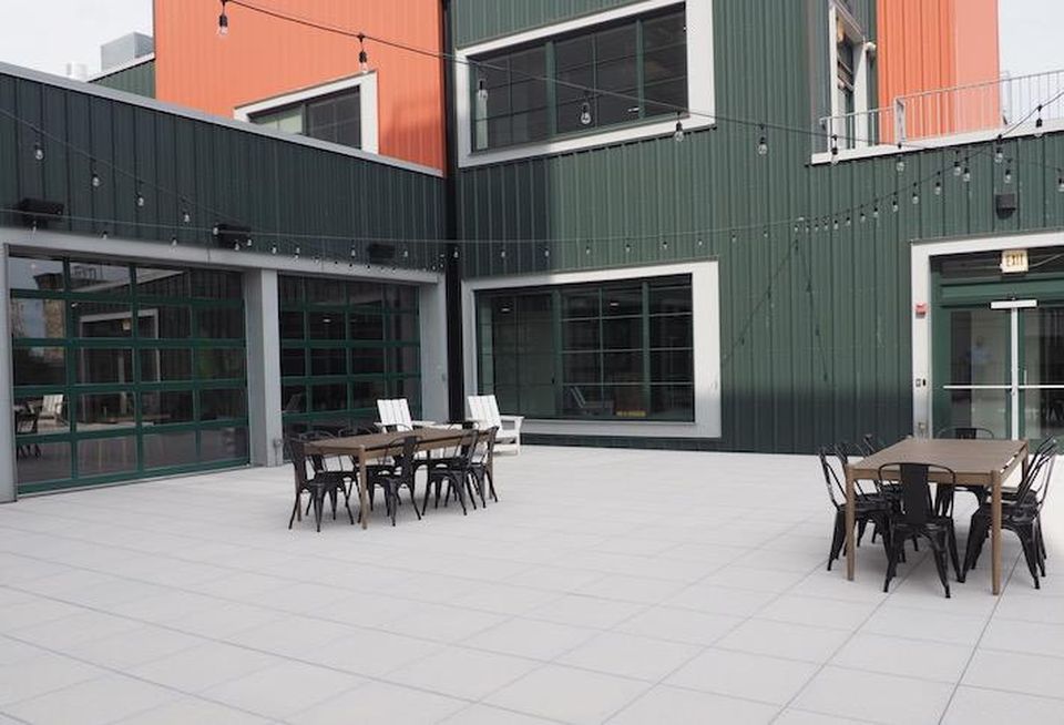 The outdoor terrace space at coworking space The Mark in the Wonder Bread Factory building.
