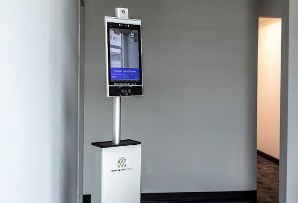 A temperature check station in an office building.