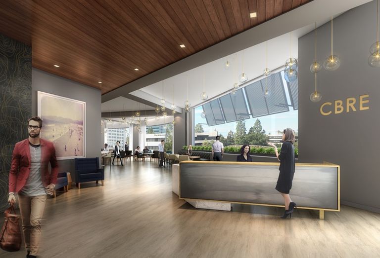 The large concierge-lobby space at CBRE's new office expands into a multi-functional amenity workspace with comfortable seating and doubles as an event space that can accommodate up to 150 people.