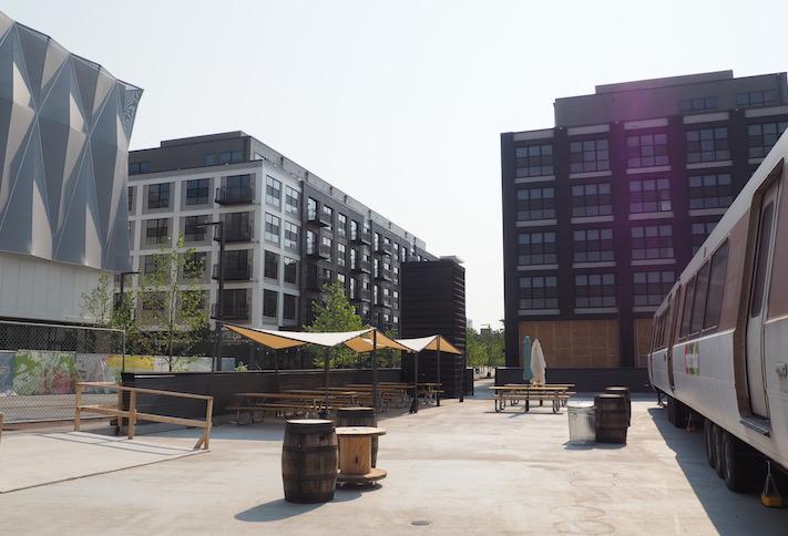 The Bryant Street development, photographed from Metrobar, with the Alamo Drafthouse building on the left and the Chase apartment buildings in the center. 