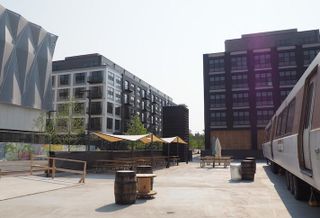 The Bryant Street development, photographed from Metrobar, with the Alamo Drafthouse building on the left and the Chase apartment buildings in the center. 