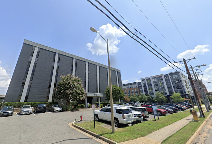 The office building at 2560 Huntington Ave. slated for redevelopment. The Parker at Huntington is also visible in the background.