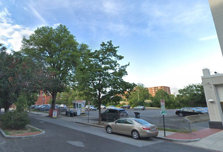 The surface parking lot at 811 Third St. NW, where a nine-story apartment building is planned