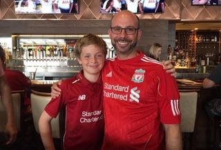 GlenLine Investment's Scott Nudelman and his son Ryan celebrating Liverpool's Champions League victory in June