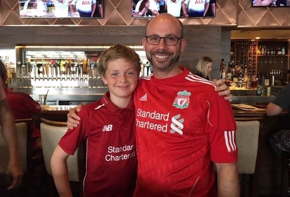 GlenLine Investment's Scott Nudelman and his son Ryan celebrating Liverpool's Champions League victory in June