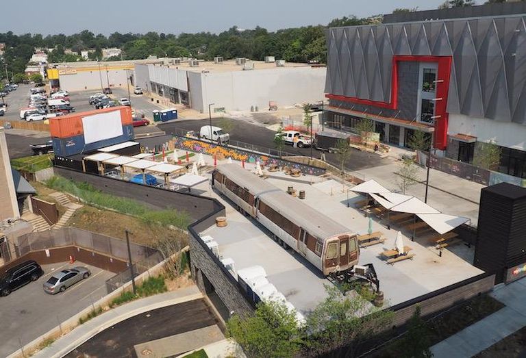 The view of Bryant Street from the rooftop of the Chase building, with Metrobar and Alamo Drafthouse in the foreground and the Phase 2 and 3 development sites in the background. 
