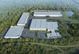 A rendering of the Hargrove Industrial Campus, with the three new buildings around the edge of the existing warehouse