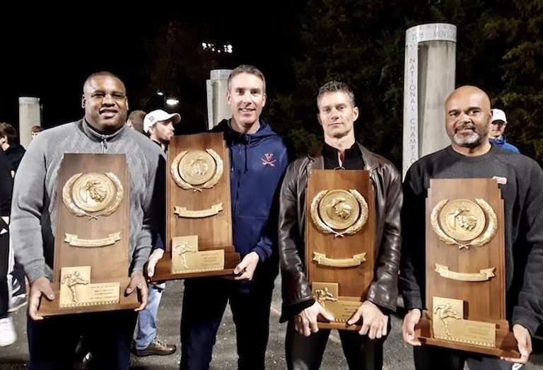 AJ Wood, second from left, with his University of Virginia soccer teammates who won four straight national championships. 