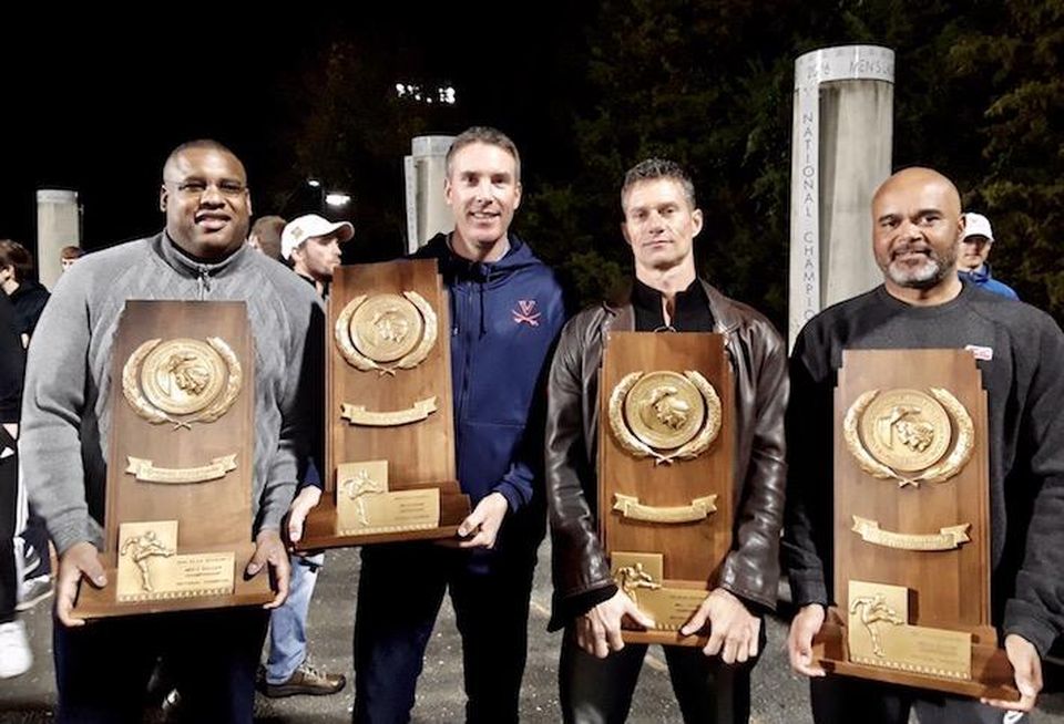 AJ Wood, second from left, with his University of Virginia soccer teammates who won four straight national championships.