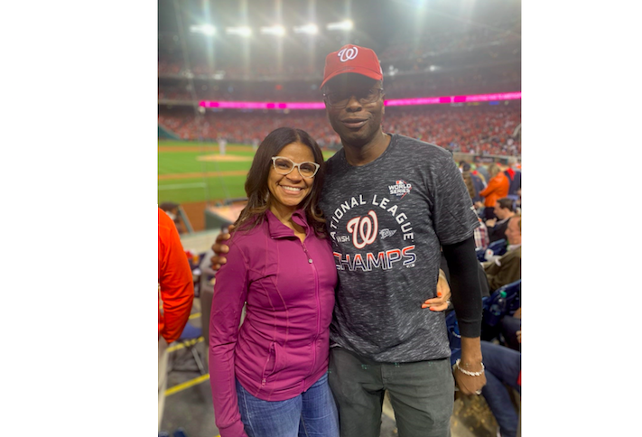 Kimpton Hotels' Telesa Via with her husband, Destination D.C.'s Elliott Ferguson at Game 3 of the World Series