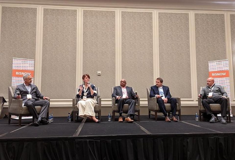 MITRE Corporation's Katy Warren (second from left) discusses federal cloud adoption at Bisnow's DICE: East with (from left) moderator David Trout of SecureIT, Intel's Melvin Greer, Oracle's Steve Derr, and CyrusOne's Anthony Rizzo.