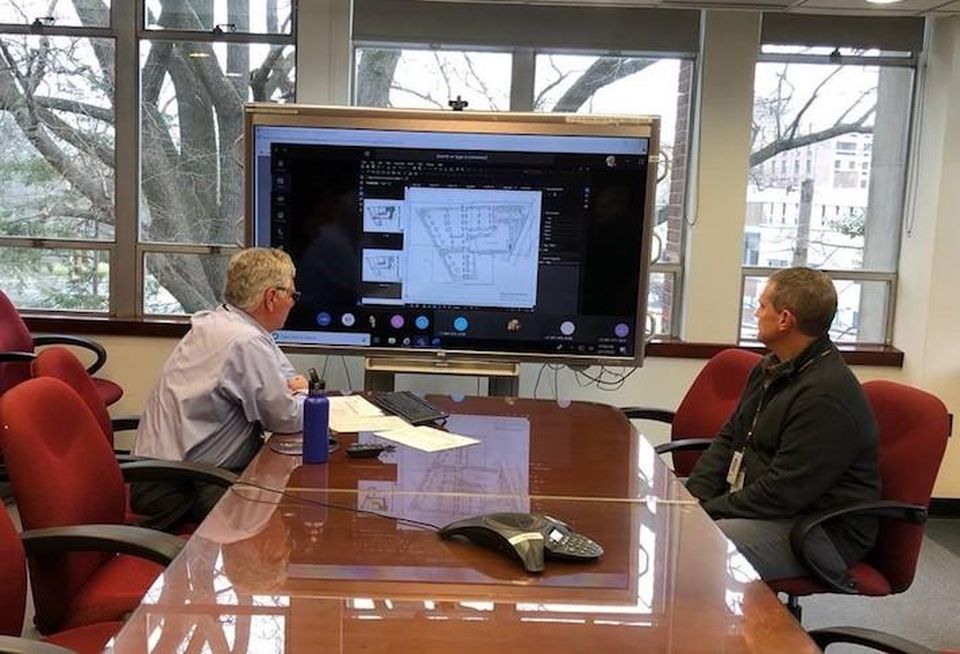 Montgomery Planning Chief of Development Review and Regulatory Coordination Mark Pfefferle and Deputy Director Robert Kronenberg conducting a committee meeting through a video conference.