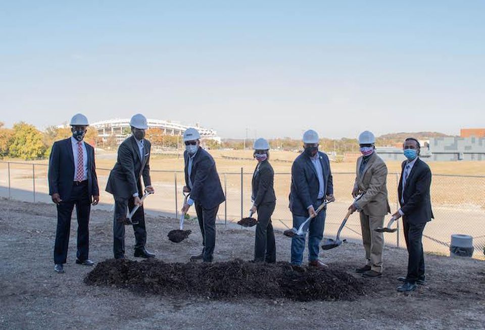 The Donatelli and BlueSkye development team and D.C. officials breaking ground on the second building at the Hill East