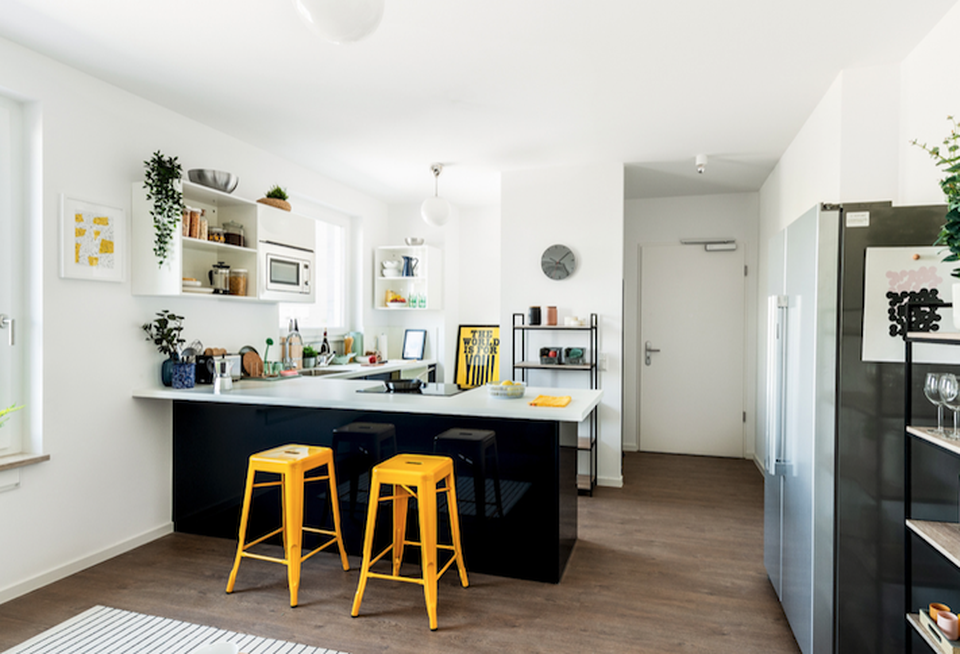 The kitchen area in a Quarters co-living space.