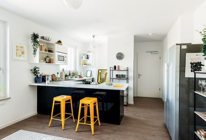 The kitchen area in a Quarters co-living space. 