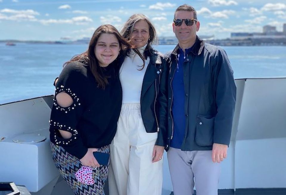 Building Engines CEO Tim Curran (right) with his wife and daughter.