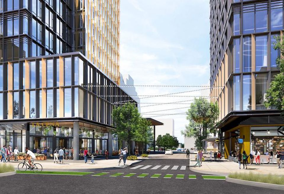 A street-level rendering of the planned Amazon HQ2 office buildings