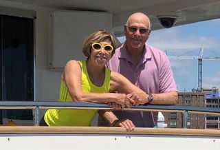 Fred Ezra and his wife, Starr, on his yacht