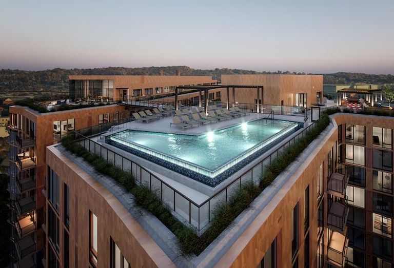 A rendering of the rooftop pool at the Illume development in Capitol Riverfront.