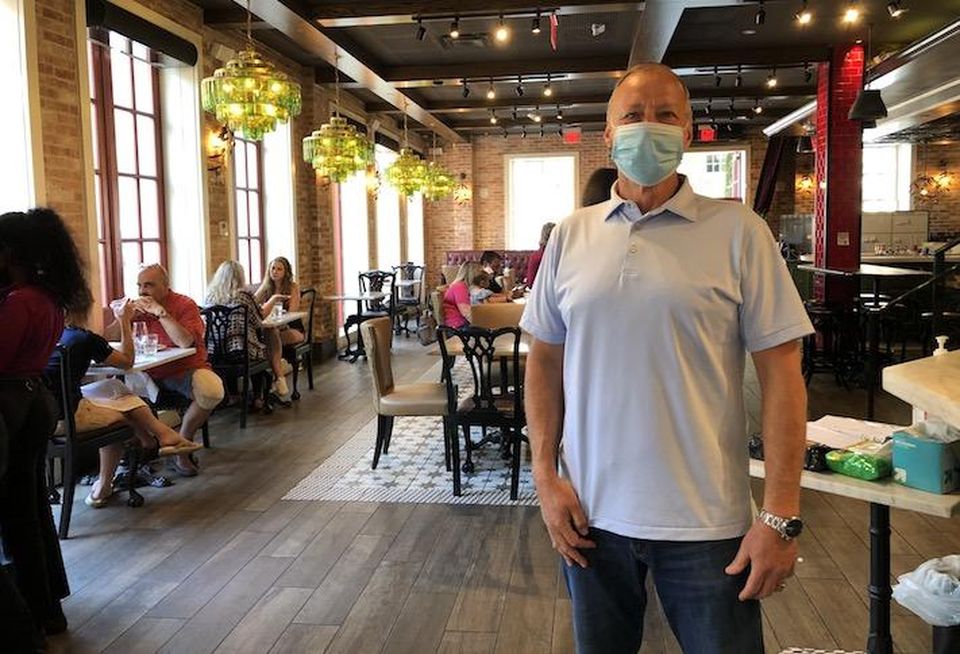 Alexandria Restaurant Partners partner Dave Nicholas, photographed inside Mia's Italian Kitchen Sunday afternoon.