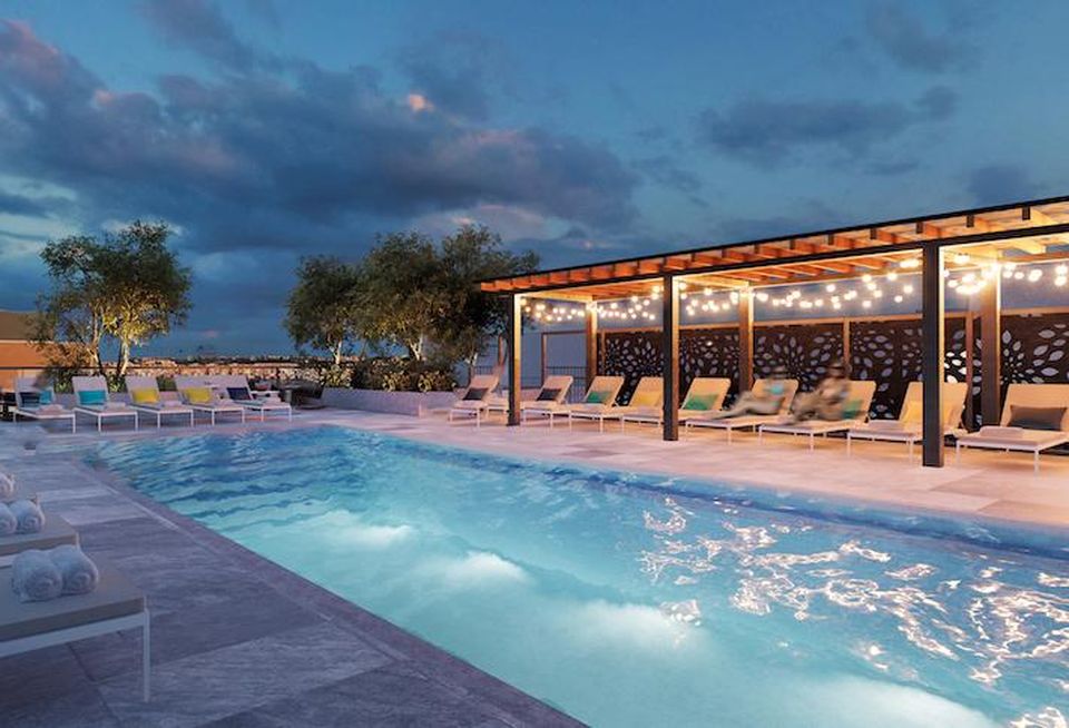 A rendering of The Kelvin's rooftop pool amenity, which is still under construction.