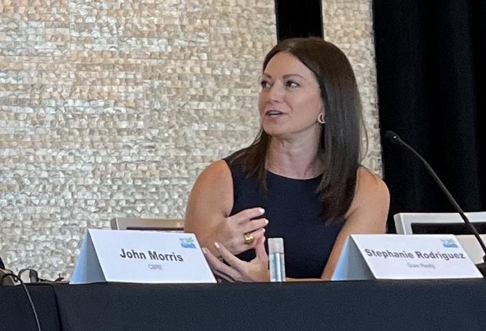 Stephanie Rodriguez, then with Duke Realty, speaking at the National Association of Real Estate Editors conference in December 2021.