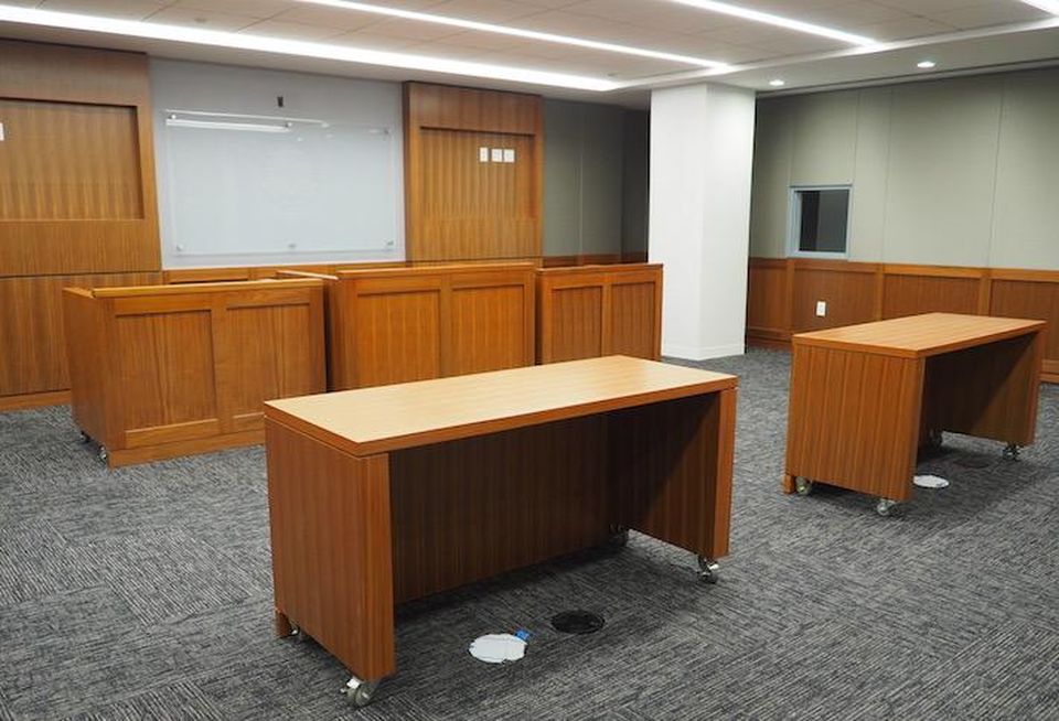 A mock courtroom in the DOJ's Constitution Square 4 office