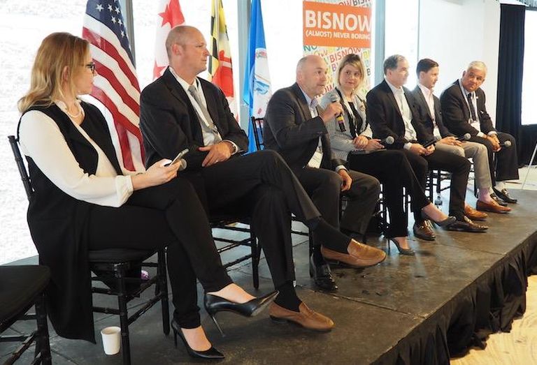 RealAtom's Yulia Yaani, Walker & Dunlop's Chris Doerr, DSC Partners' Doug Donatelli, Rockefeller Group's Hilary Allard Goldfarb, Abdo Development's Jim Abdo, JLL's John Sikaitis and EagleBank's Tony Marquez