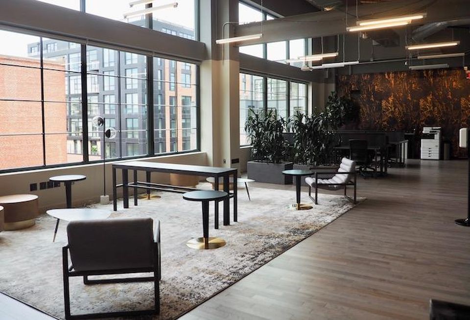 A lounge space, with the couches yet to be installed, in The Mark coworking space at the Wonder Bread Factory building.