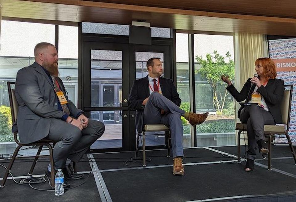 Ameristar's Amy Dunton discusses data center security with Tarrant County's David Grantham (center) and NTT's Tim Atchison (left).