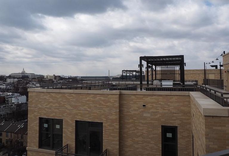 The rooftop courtyard and view of the U.S. Capitol atop the Avec building on H Street. 